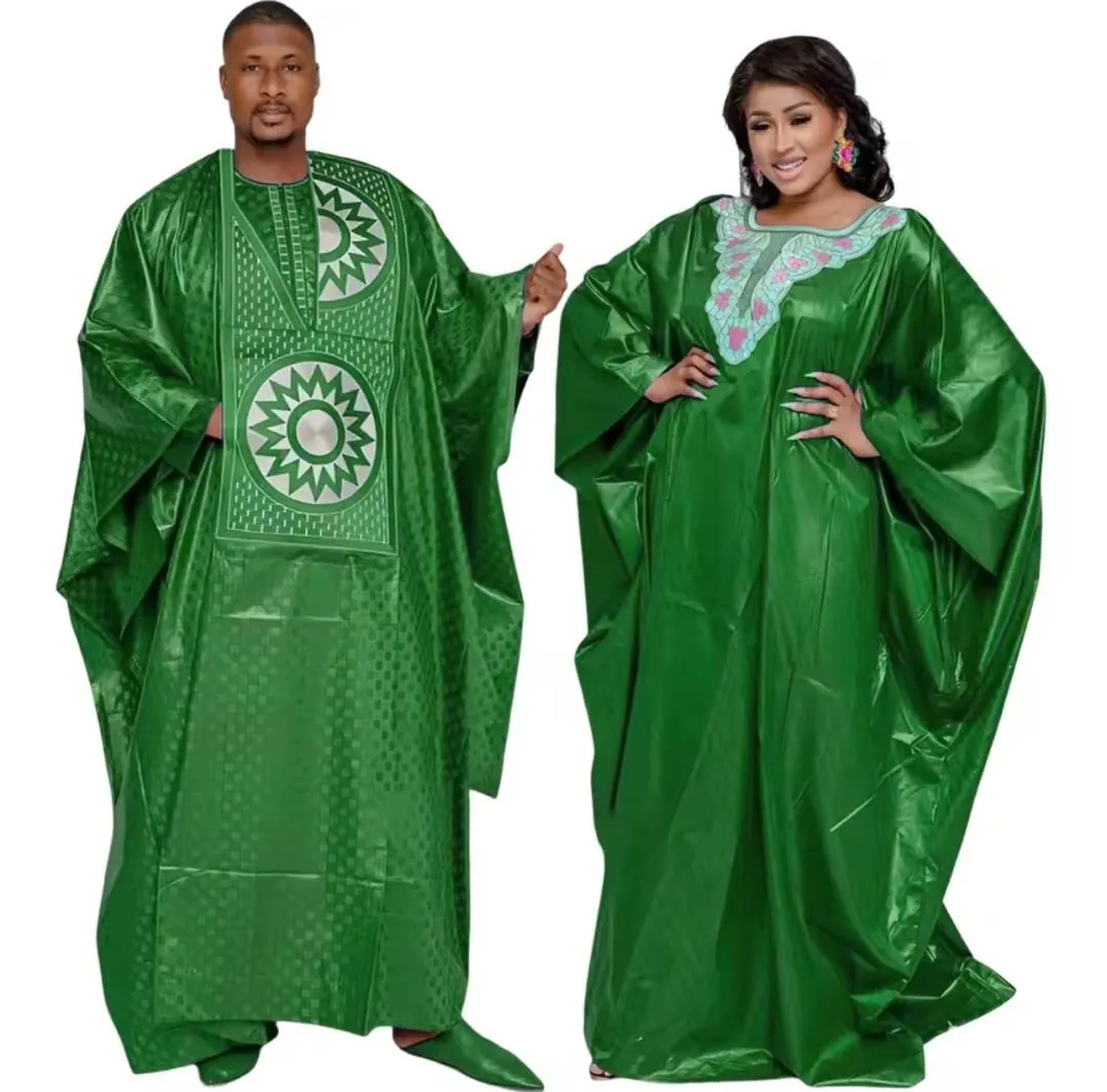 Models wearing the emerald green KAUNA collection